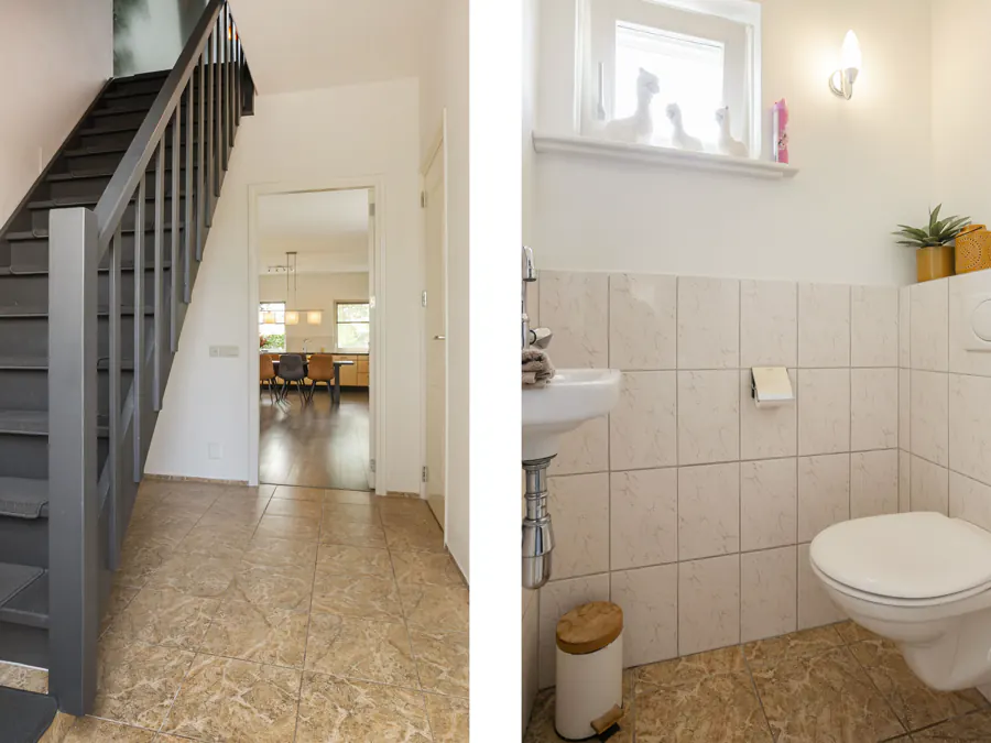 De hal met de trap naar boven en het toilet met wastafel